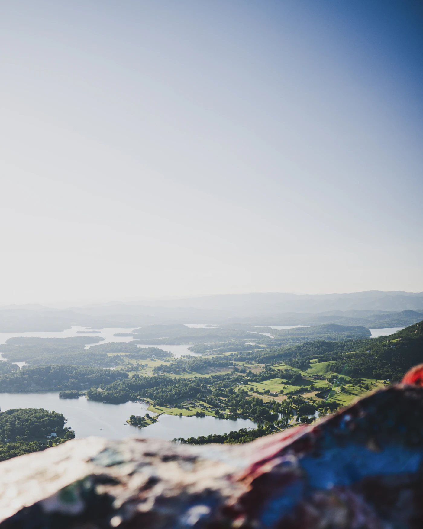 Hazy layered ridgelines and forested valleys seen from a North Georgia mountain overlook