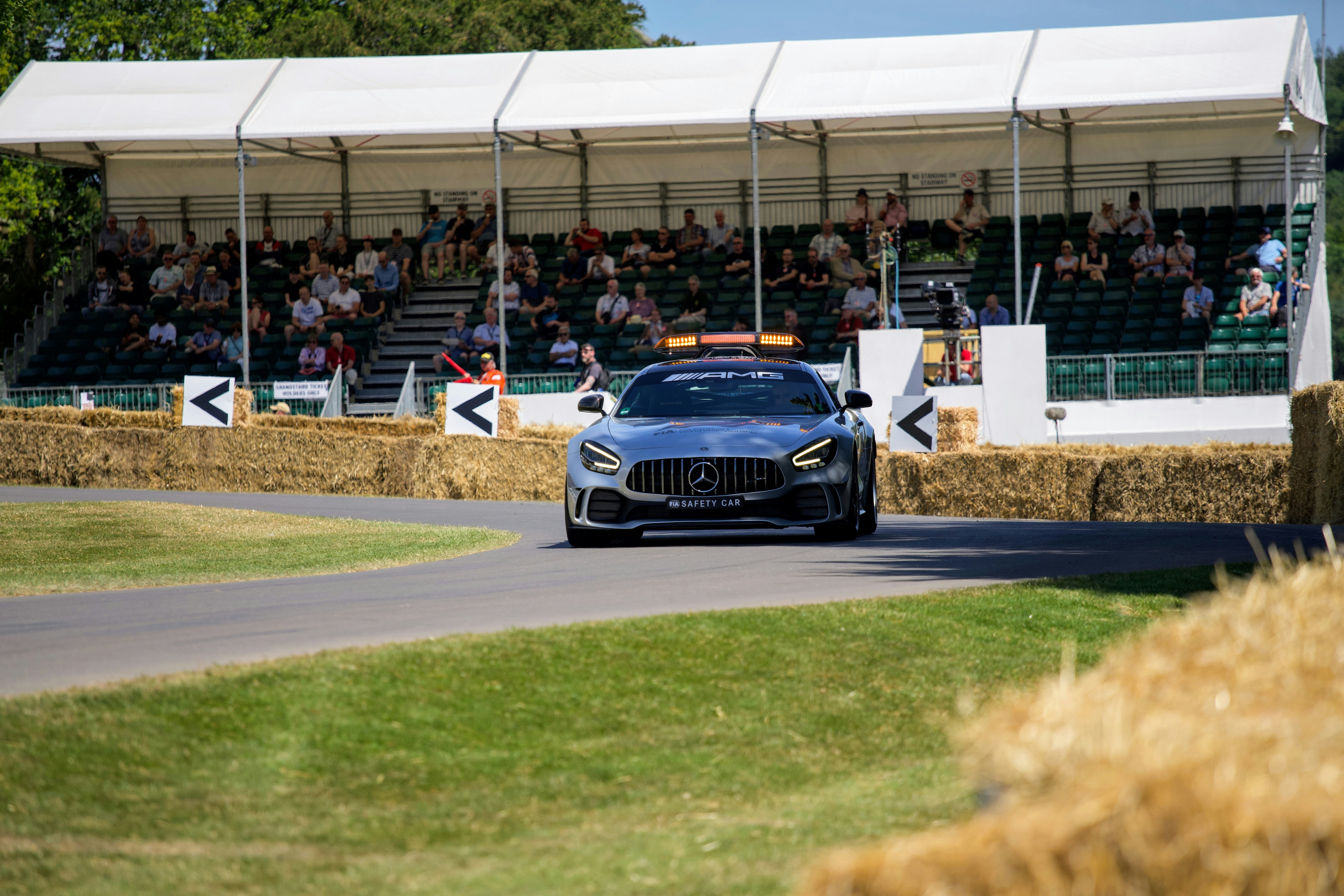 black and white porsche 911 on road during daytime