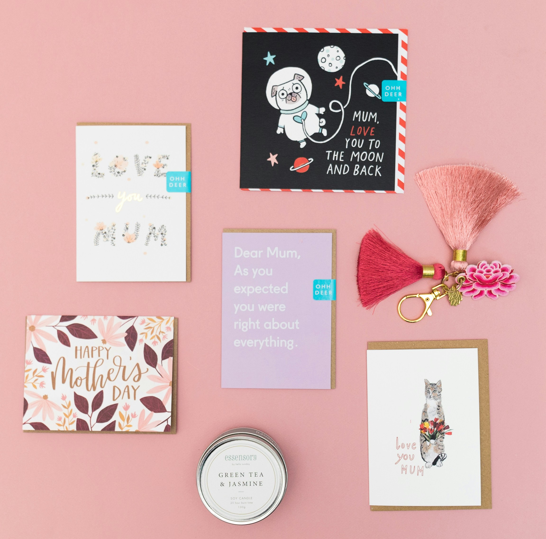 happy birthday greeting card on pink surface