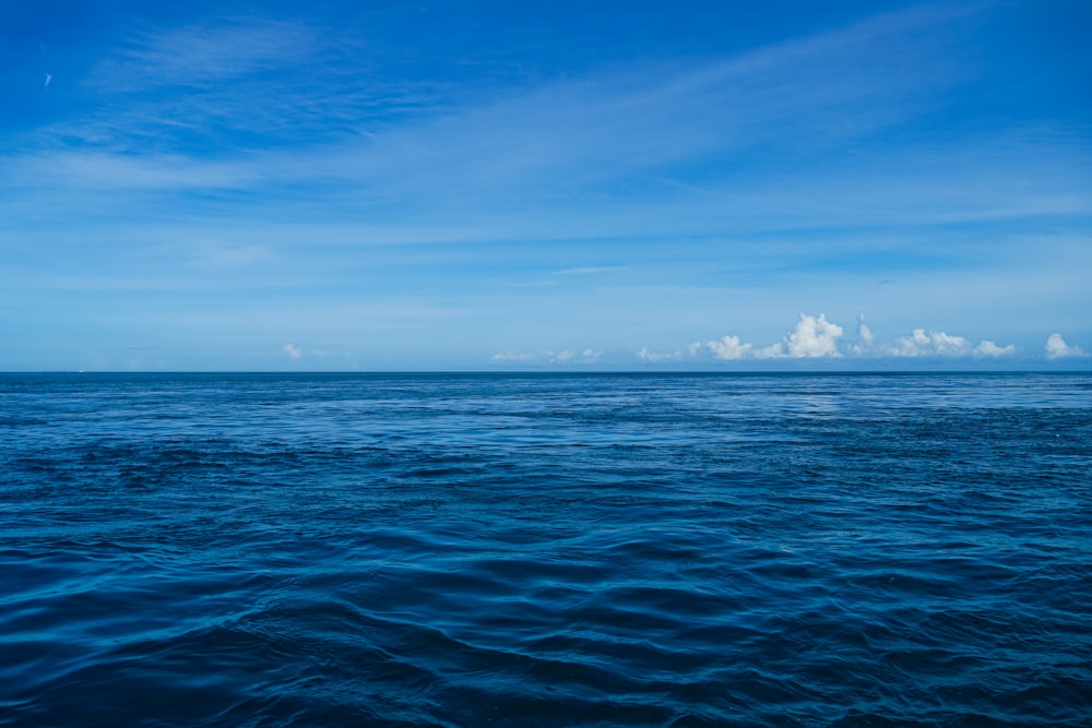 blue sea under blue sky during daytime