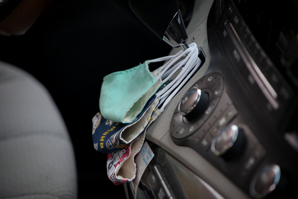 green textile on car center console