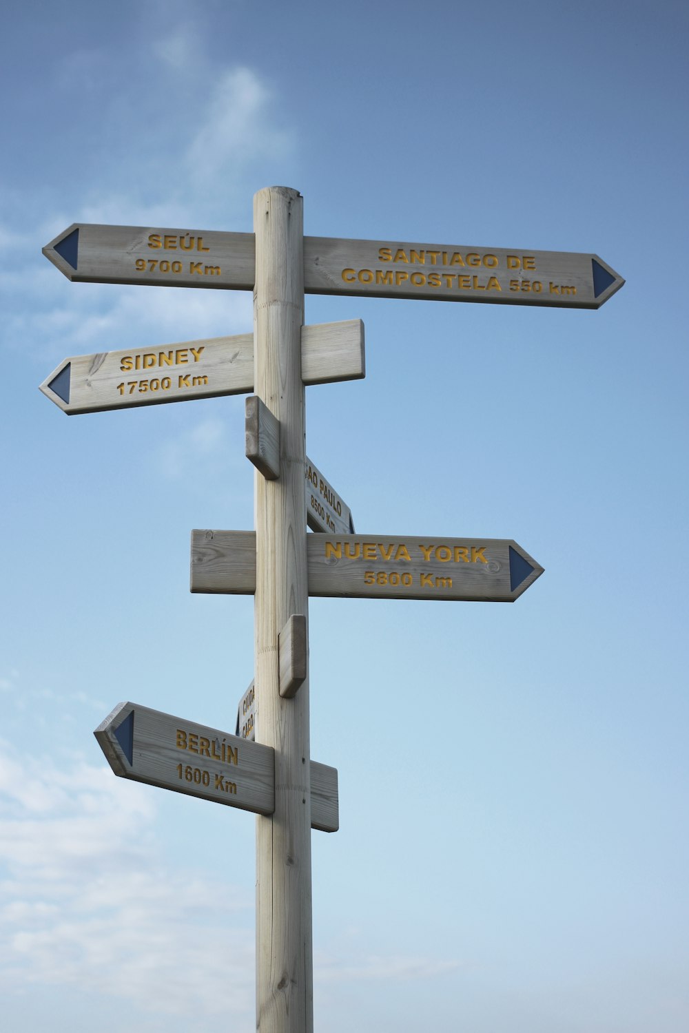 brown and black street sign