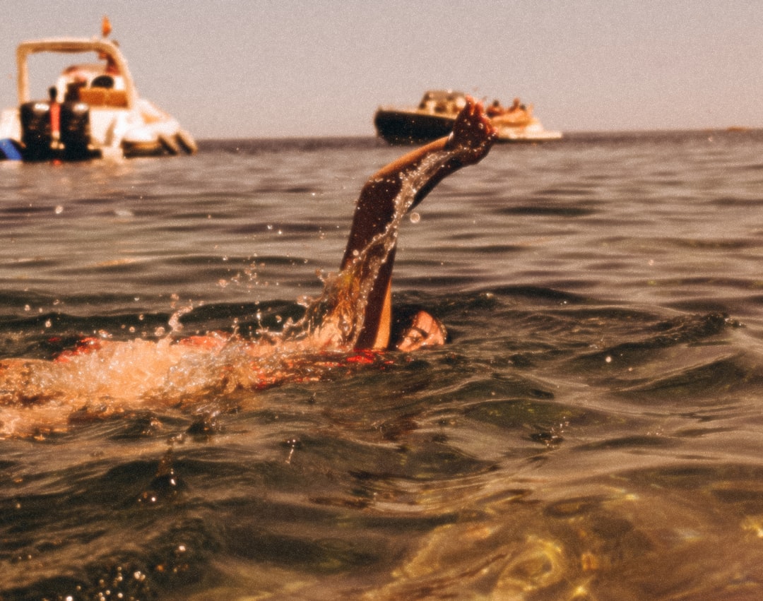 person in water during daytime