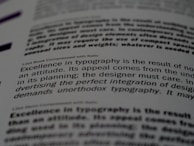 A modern digital typesetting screen showing lorem ipsum text in a design layout.