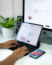 person using black and silver laptop computer
