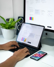 person using black and silver laptop computer
