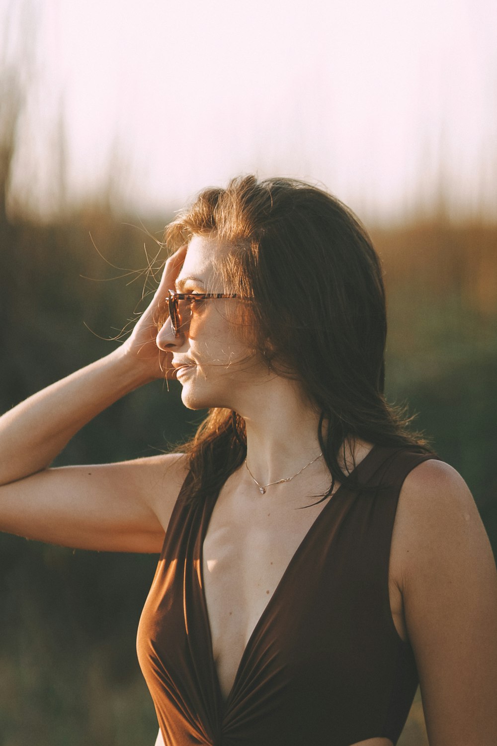 woman in black tank top wearing eyeglasses