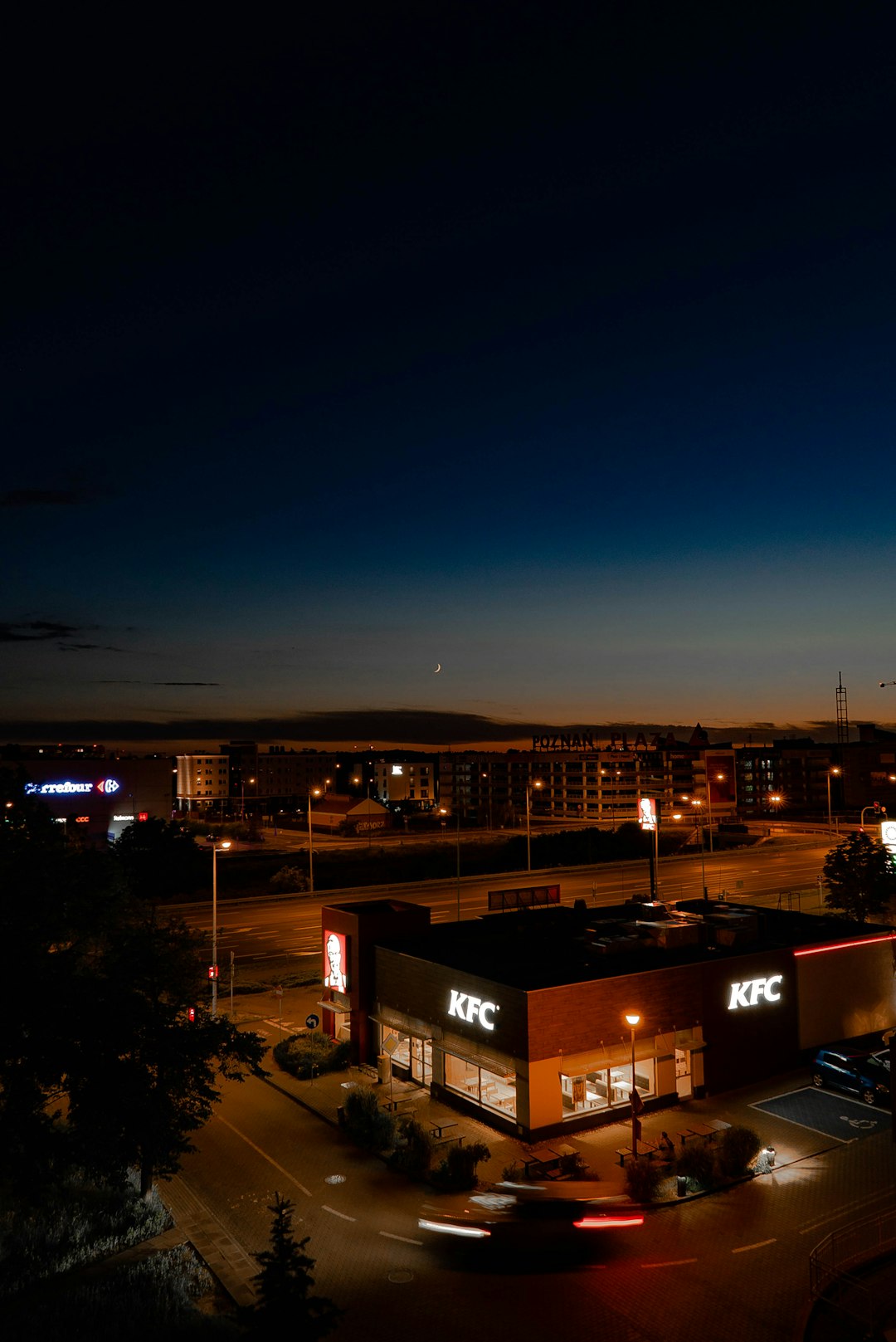 city with high rise buildings during night time