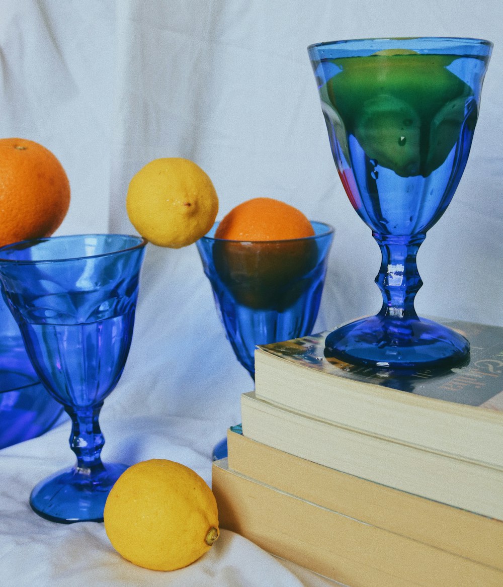 blue glass vase on white and blue wooden drawer