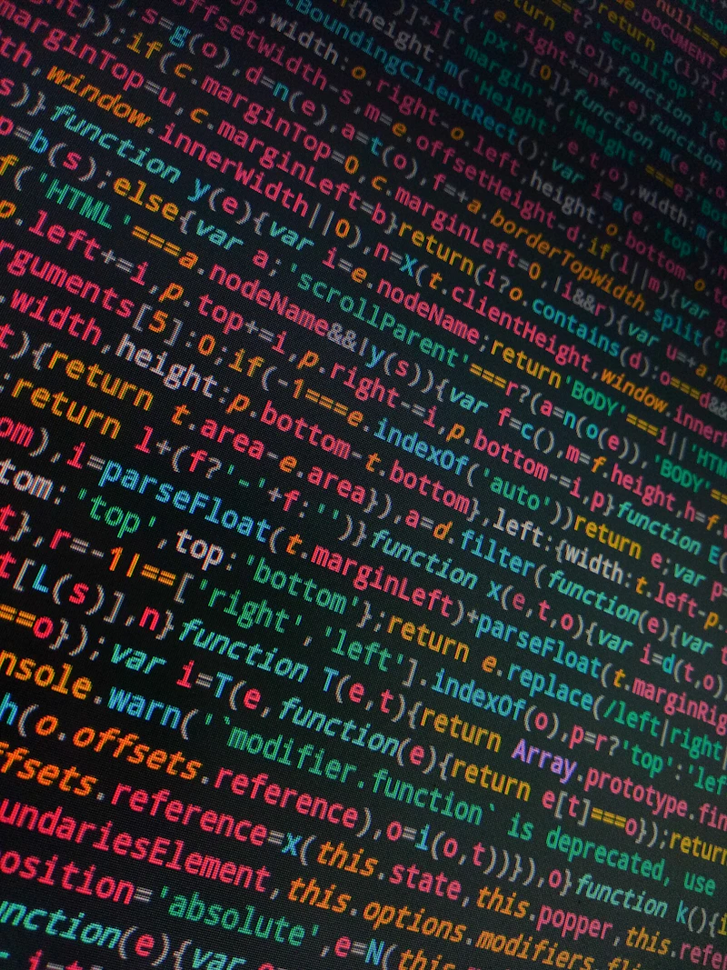 Colorful JavaScript code on a dark screen