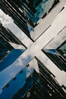 low angle photography of high rise buildings under blue sky during daytime