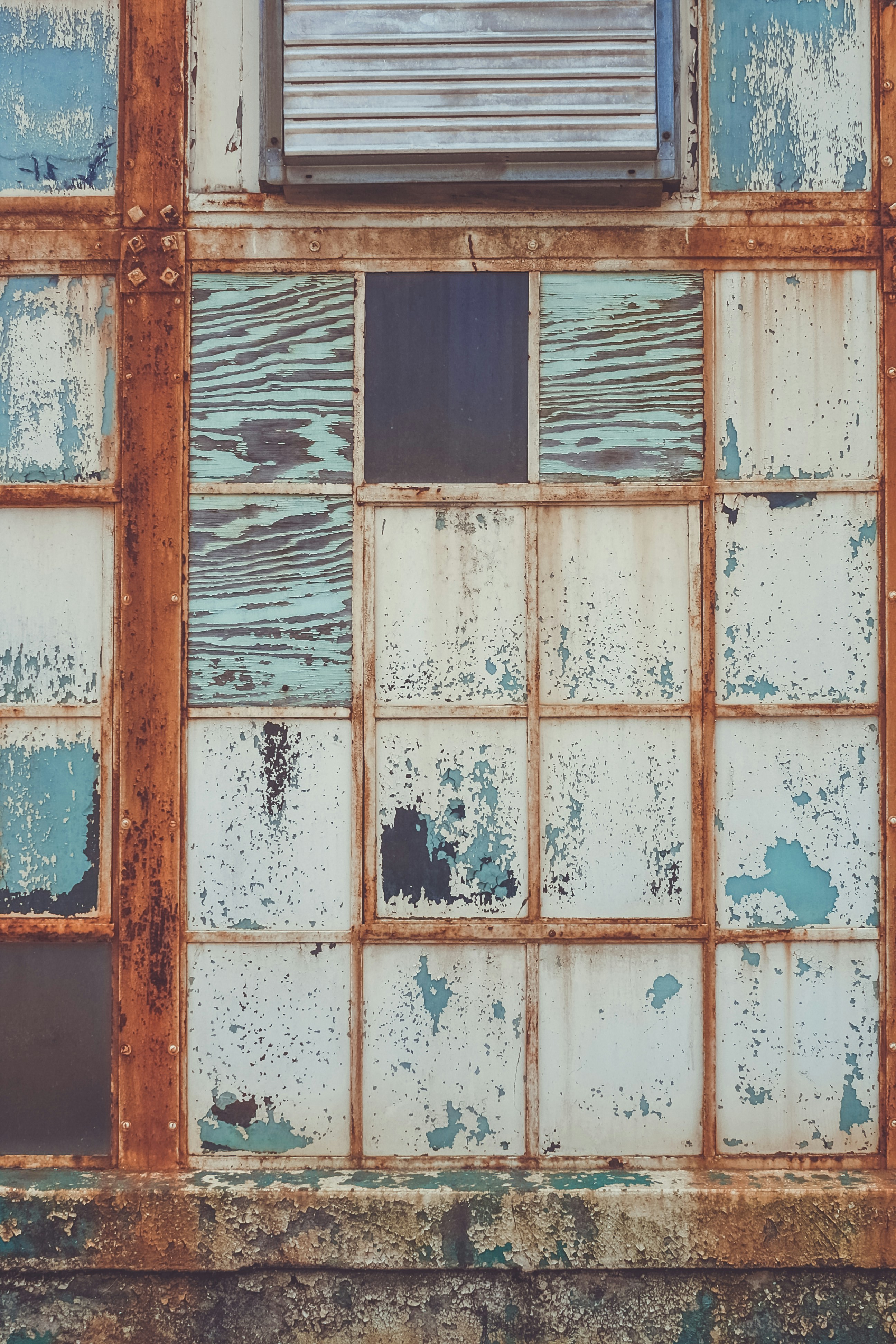 brown wooden framed glass window