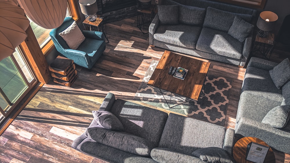 a living room filled with furniture and a fire place