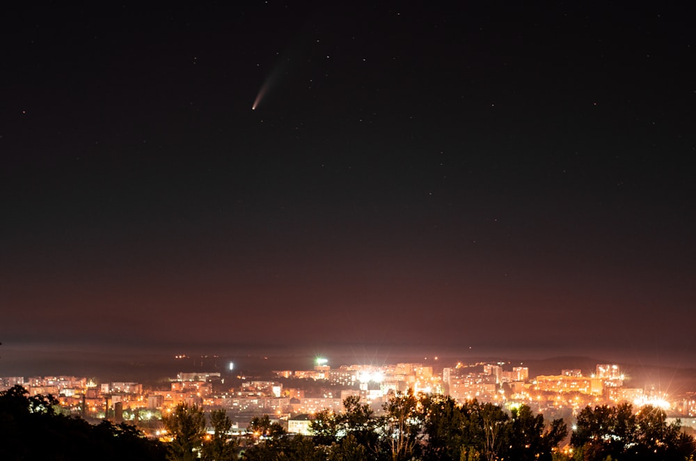 city lights turned on during night time