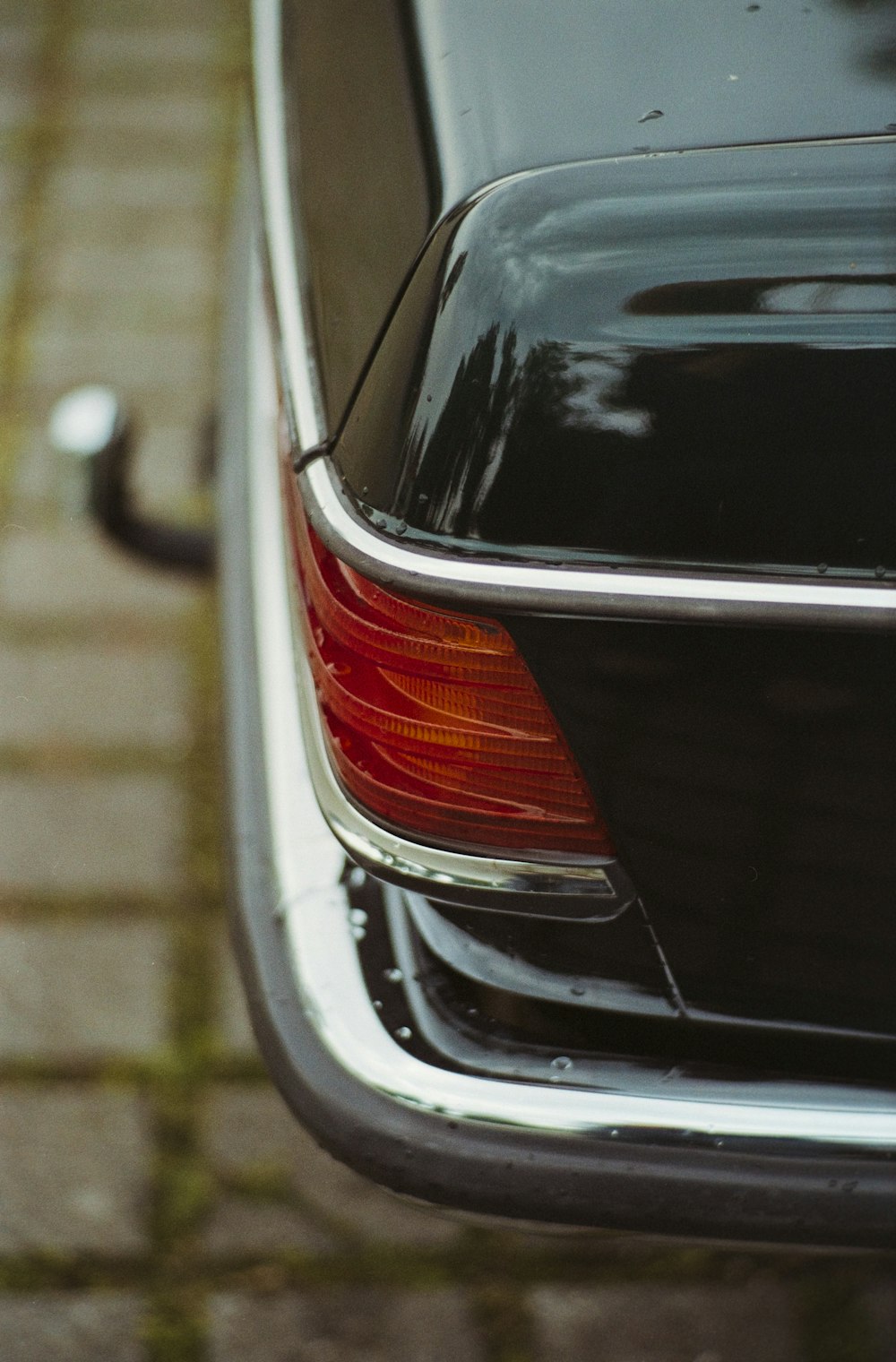 black car with red and silver license plate