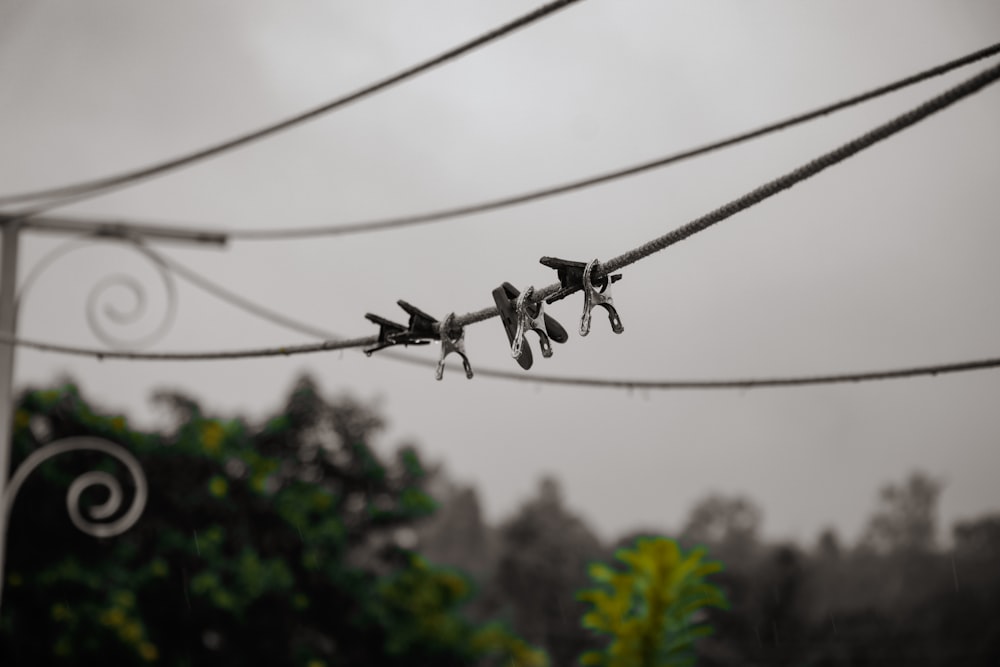 gray and black drone in mid air during daytime