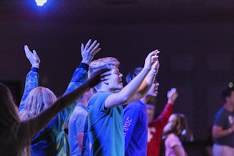 a group of people standing next to each other