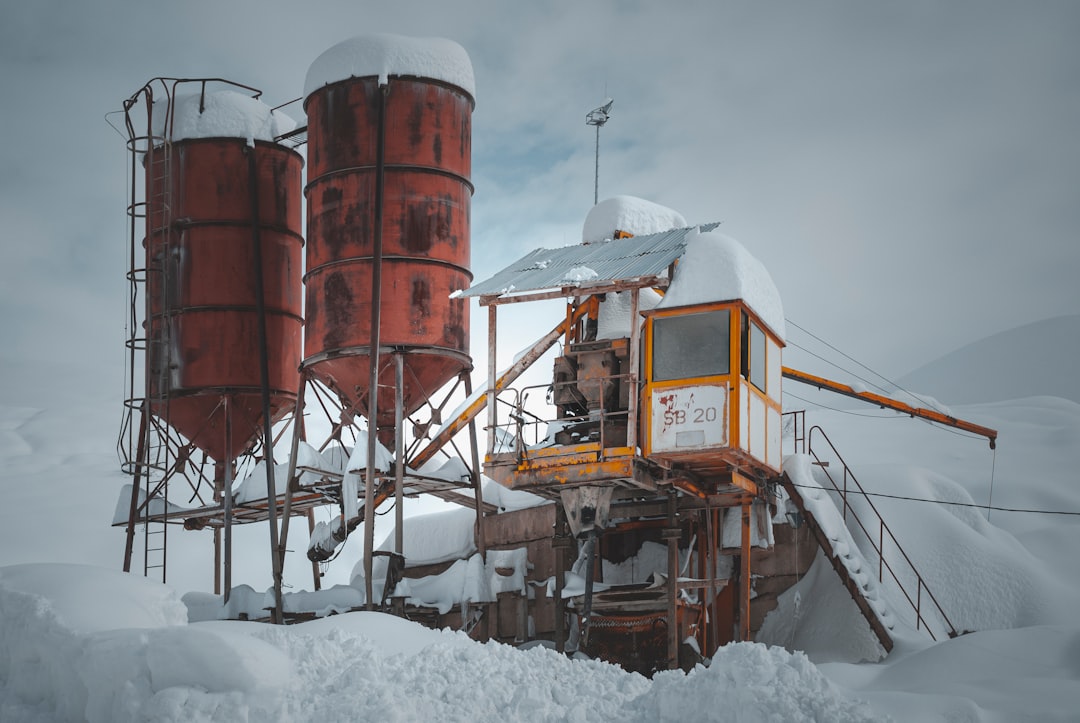 brown and white metal water tank