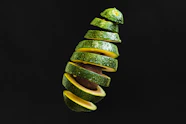 sliced green and yellow fruit