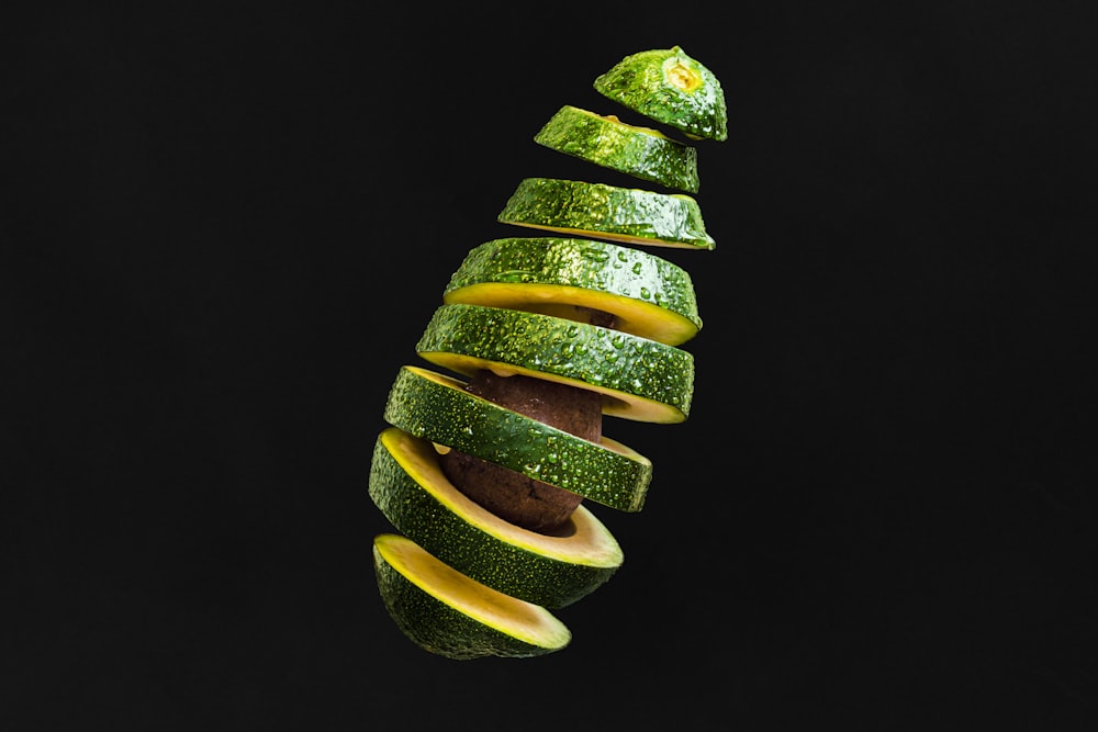 sliced green and yellow fruit