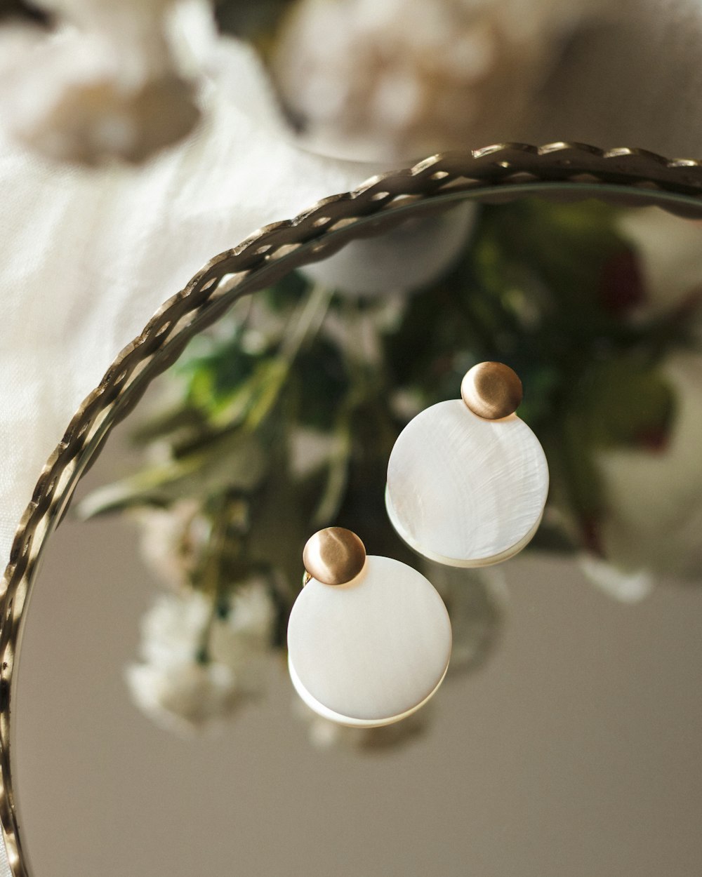 white round ornament on brown woven basket