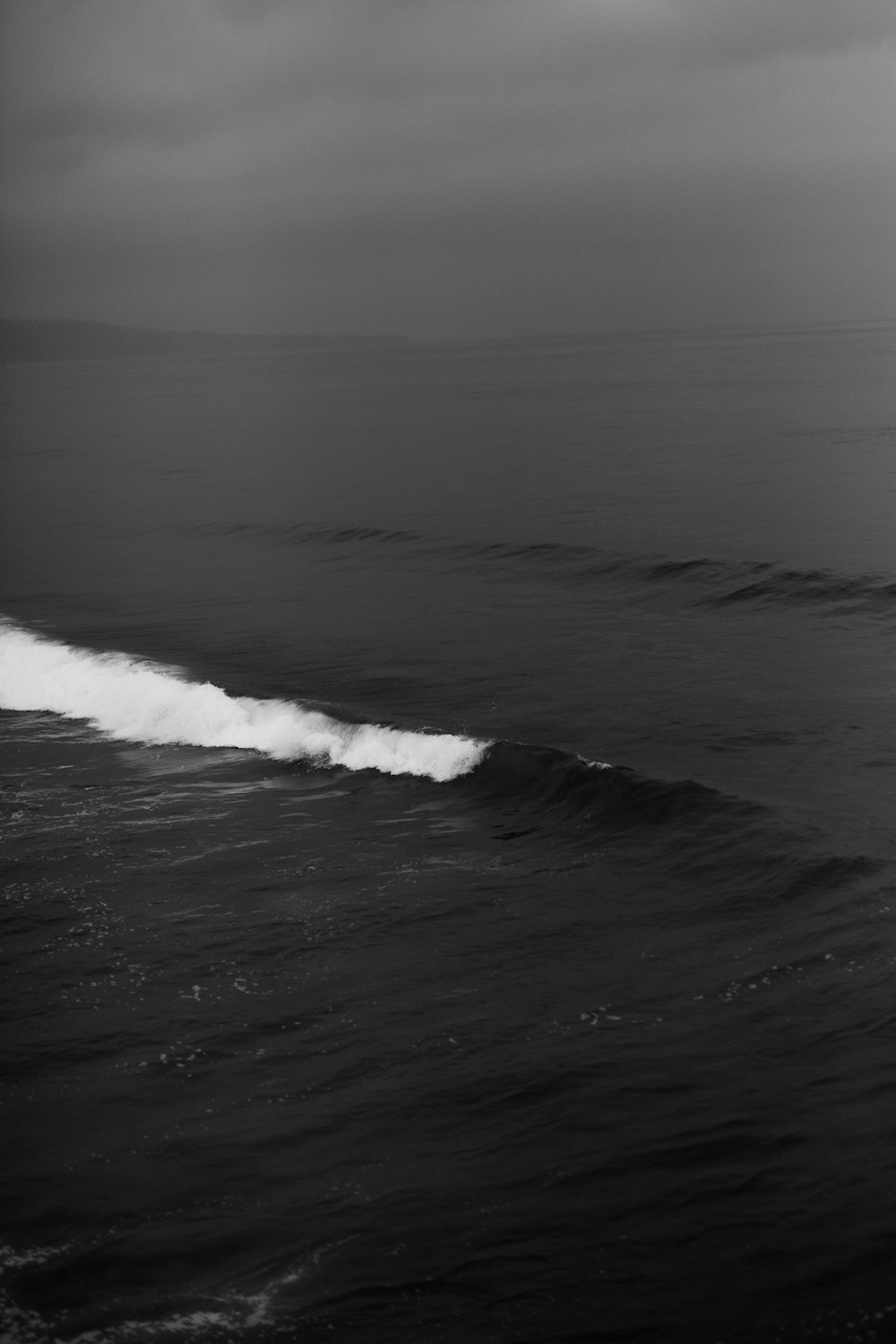 grayscale photo of ocean waves