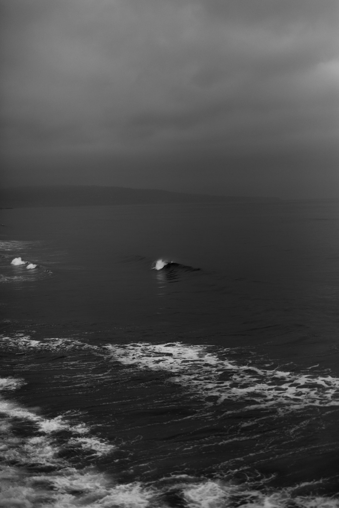 grayscale photo of sea waves