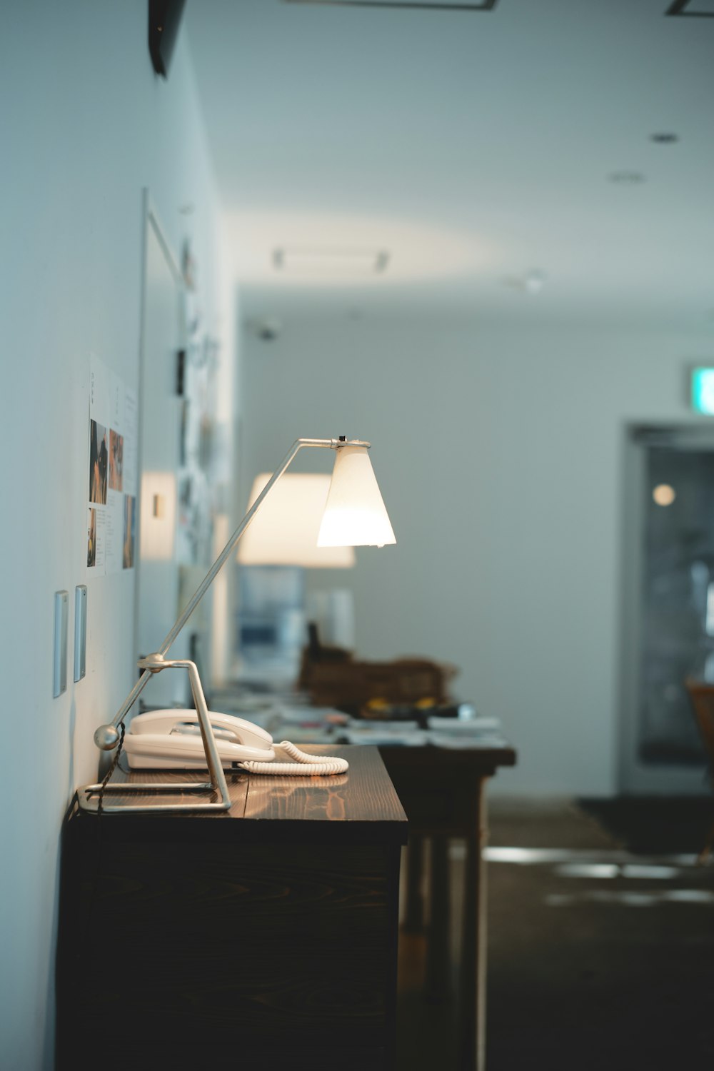 white table lamp on brown wooden table