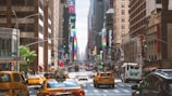 A bustling New York street filled with taxis and rideshare vehicles.