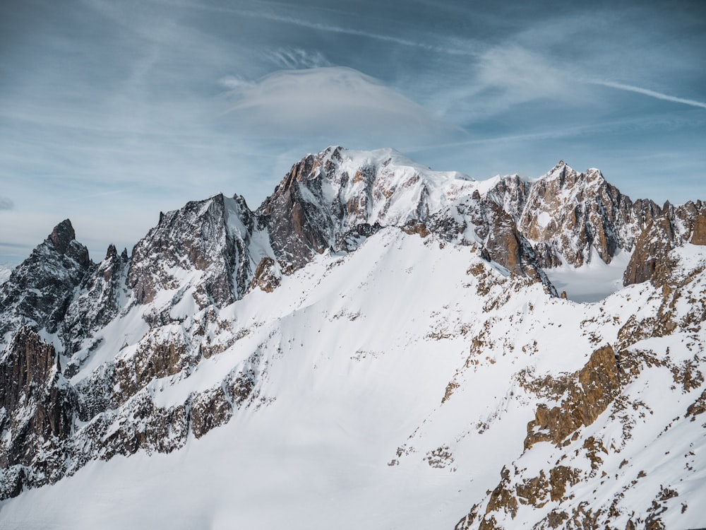 snow covered mountain under blue sky during daytime