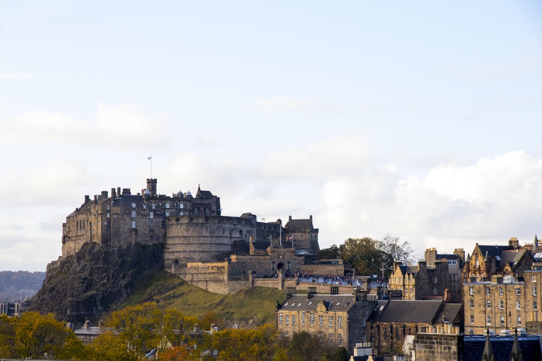 brown concrete building on top of hill, Edinburgh Castle - Scotland