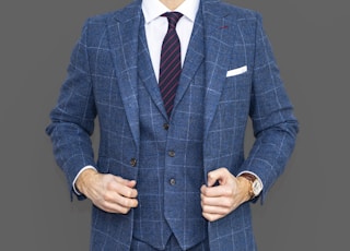 man in blue suit jacket
