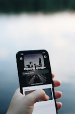 person holding black iphone 7