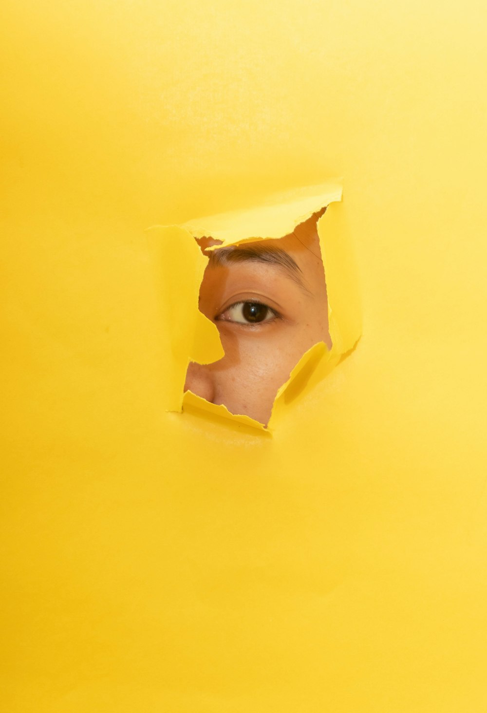 man in yellow face mask