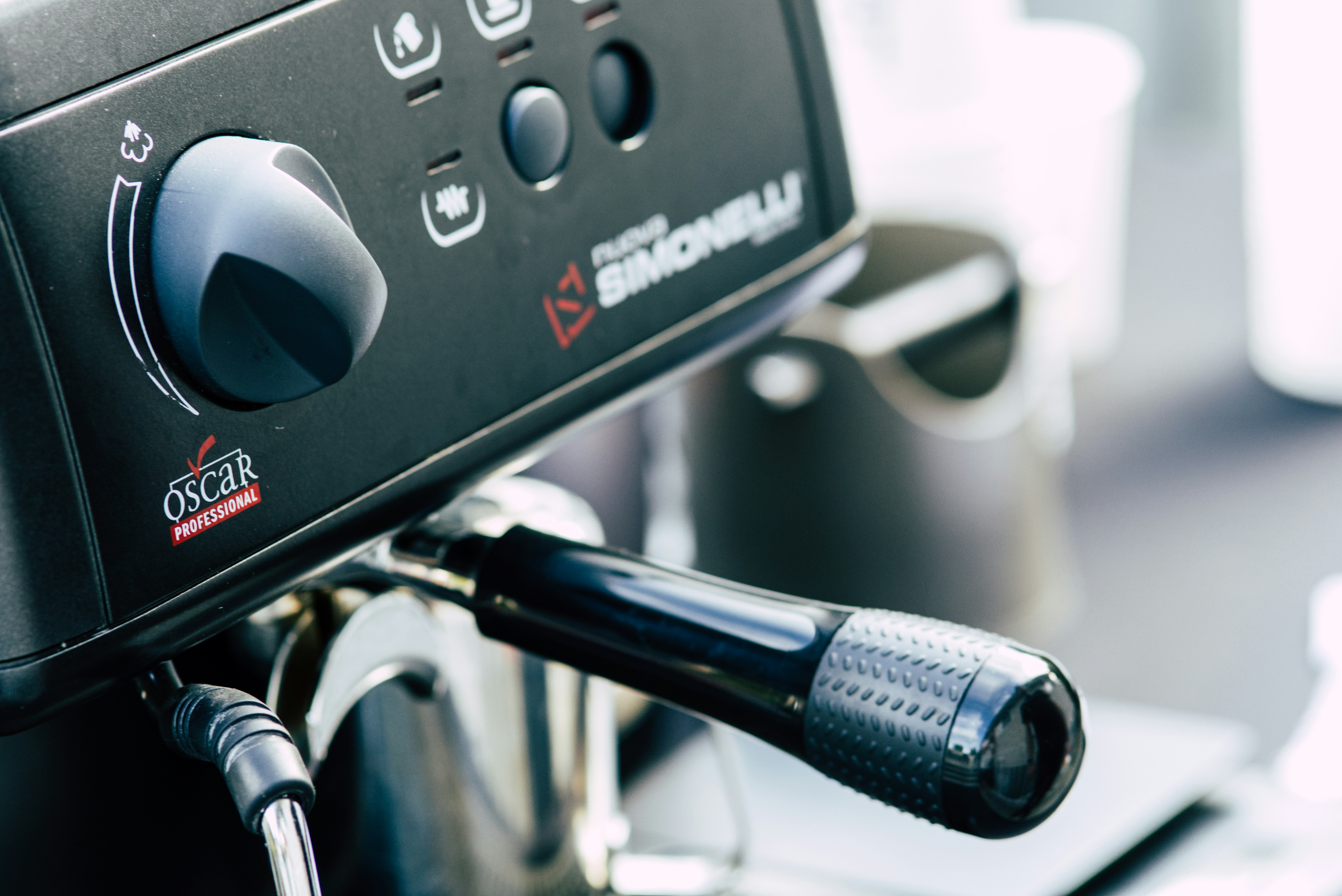 Espresso machine controls and group area during model-specific troubleshooting