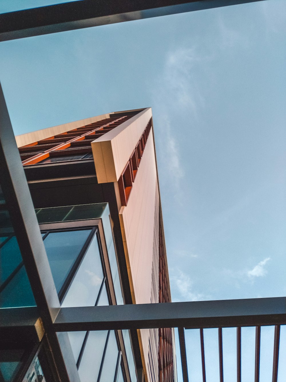 brown concrete building under blue sky during daytime