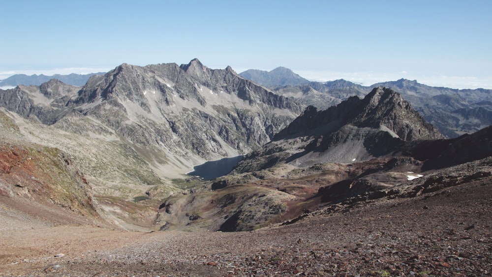 brown and green mountains under blue sky during daytime