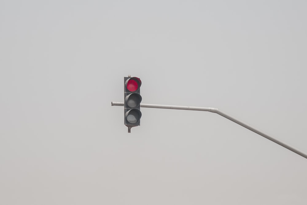black traffic light on red light