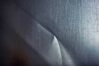 A contemplative fine art piece showcasing subtle color gradations and tactile surfaces