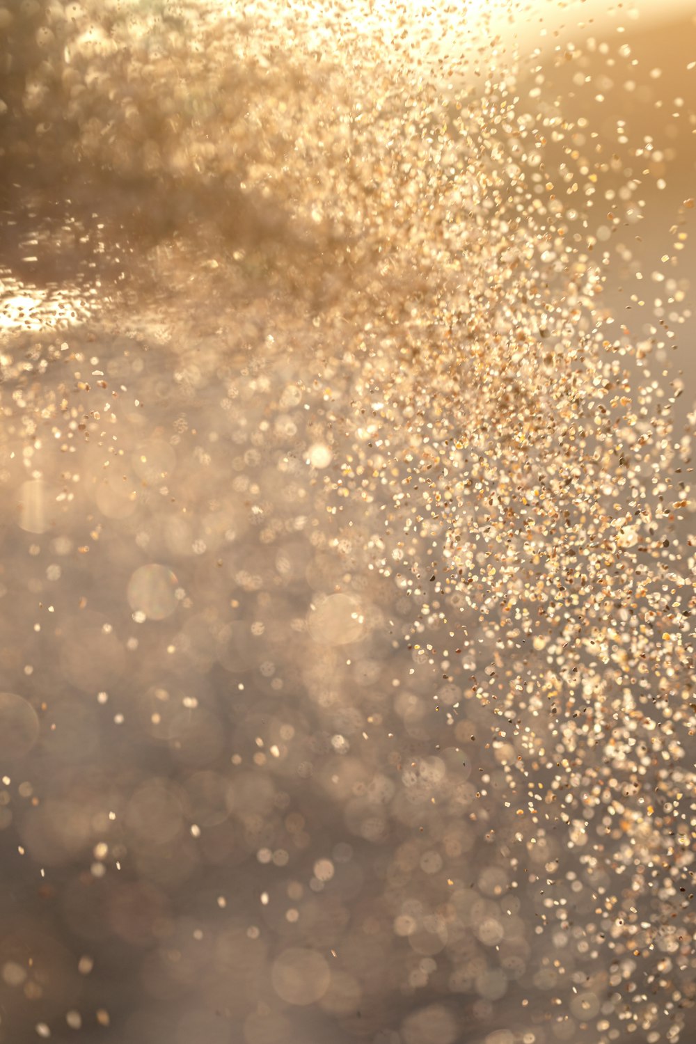 water droplets on brown surface