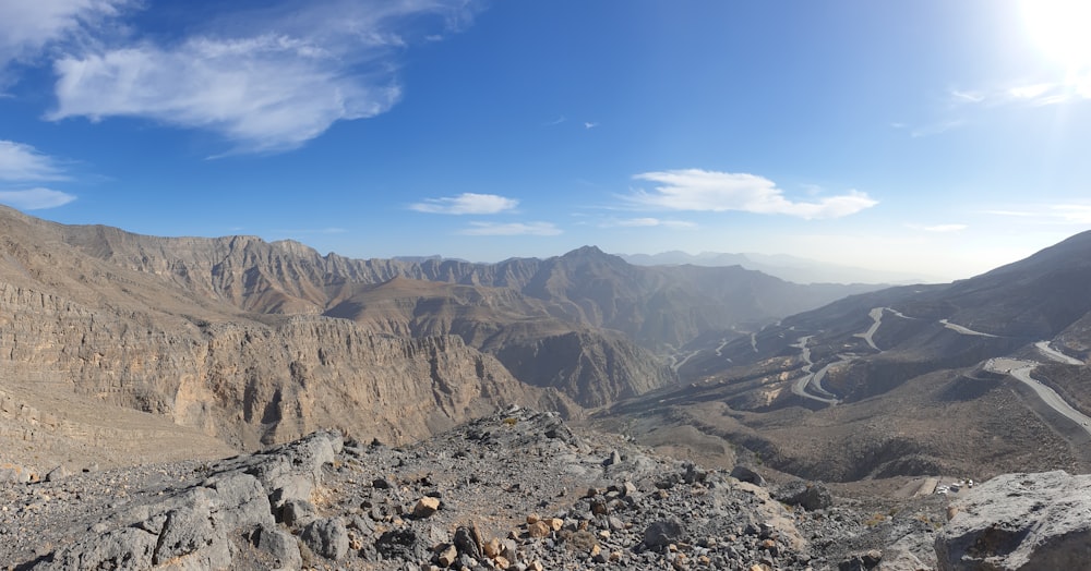 brown rocky mountain under blue sky during daytime