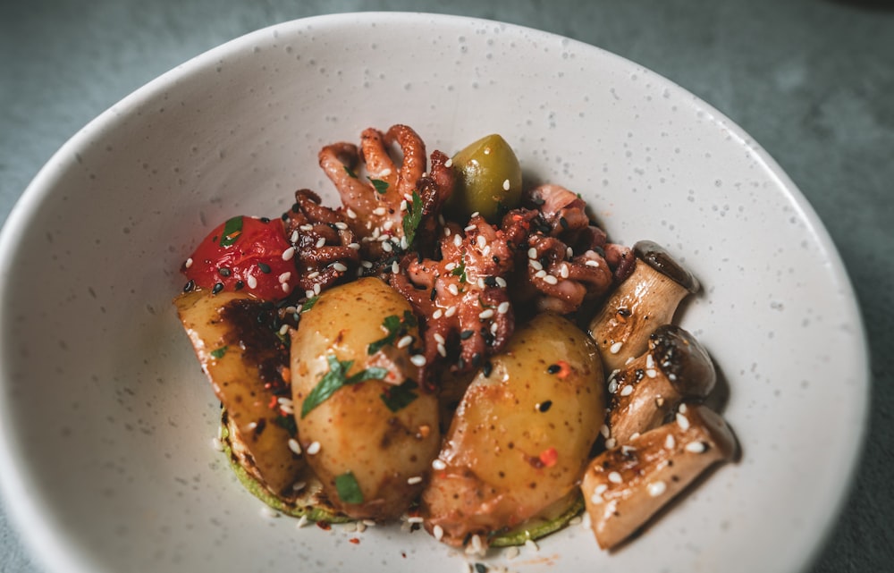 sliced tomato and chili on white ceramic bowl