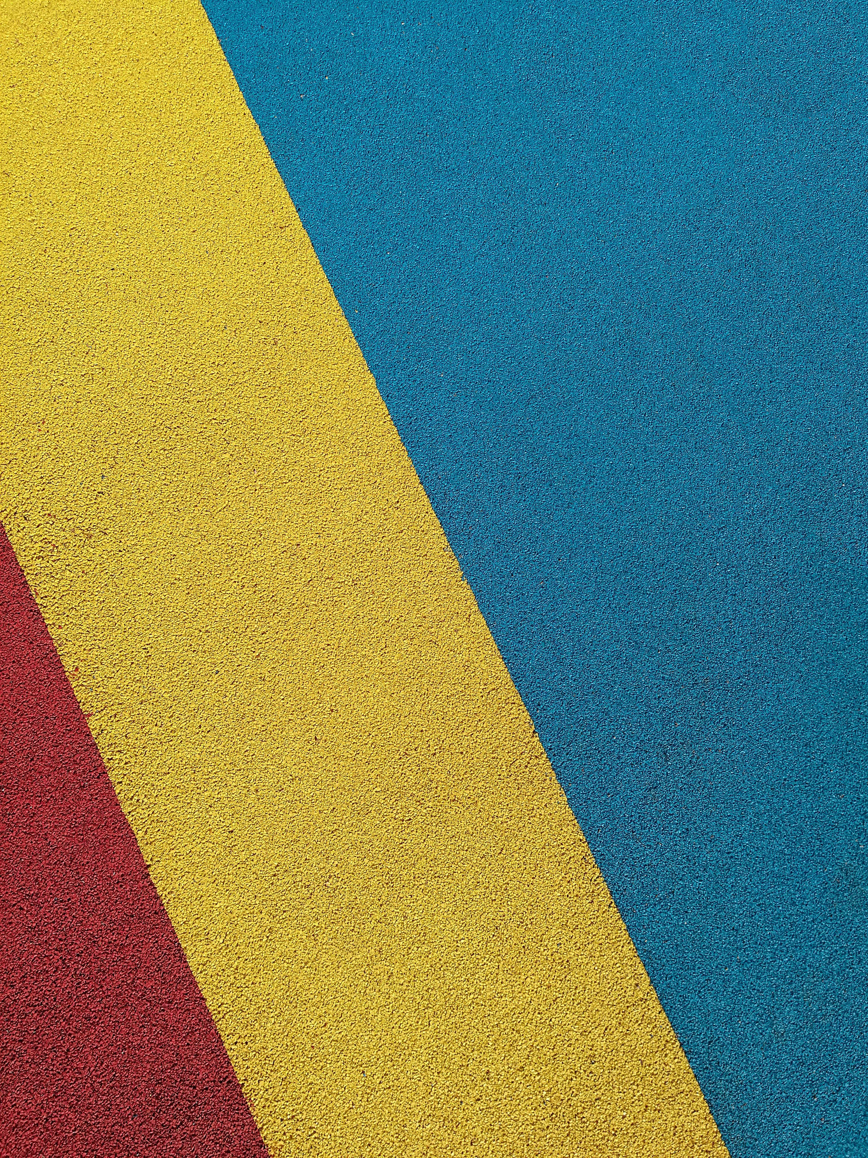 yellow red and blue striped textile