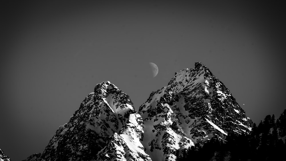 grayscale photo of snow covered mountain