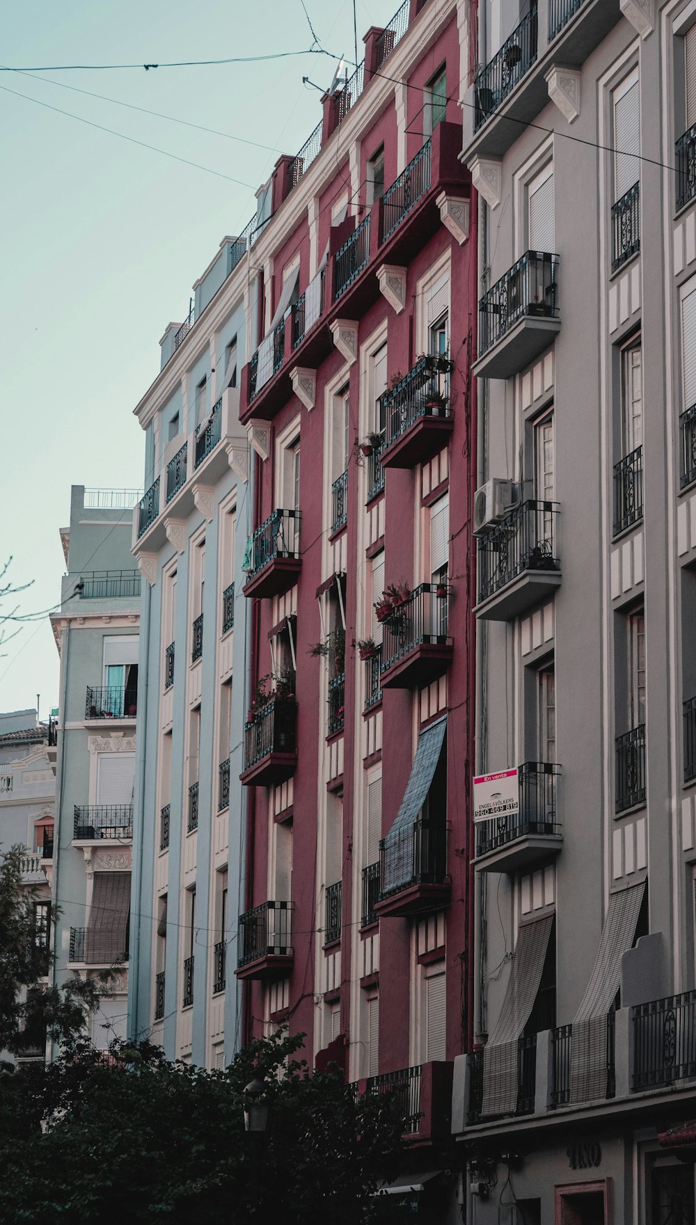 red and white concrete building during daytime