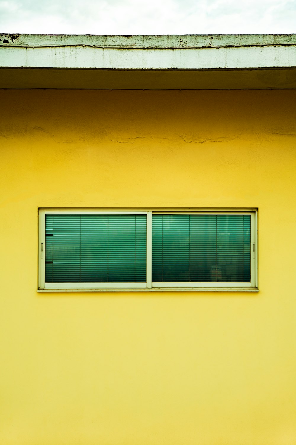 white wooden framed glass window