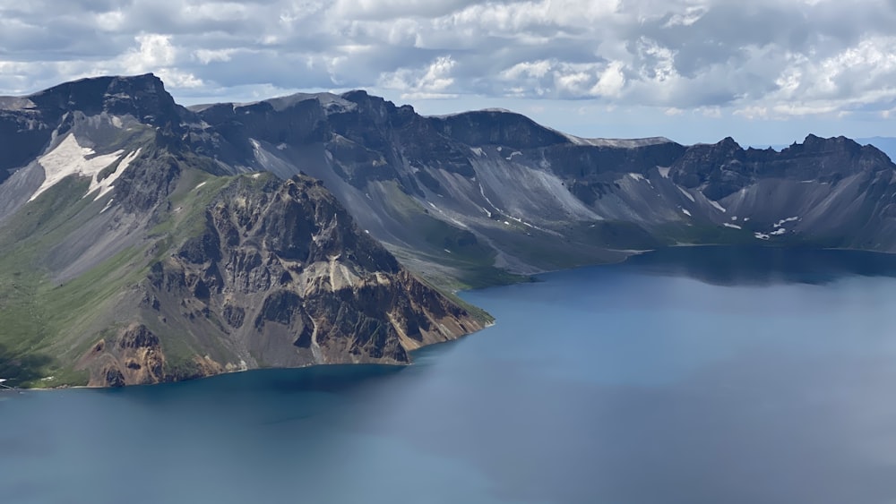 a large body of water surrounded by mountains