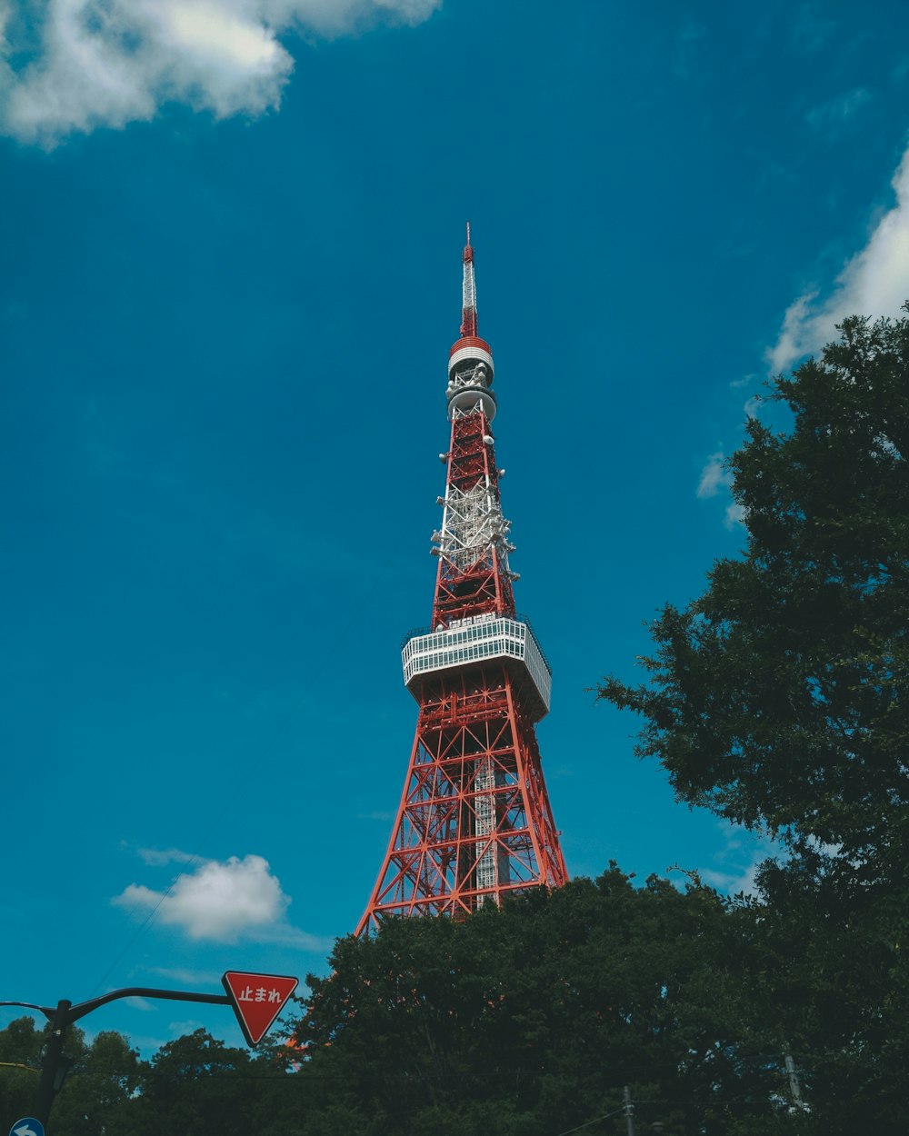 red and white tower under blue sky