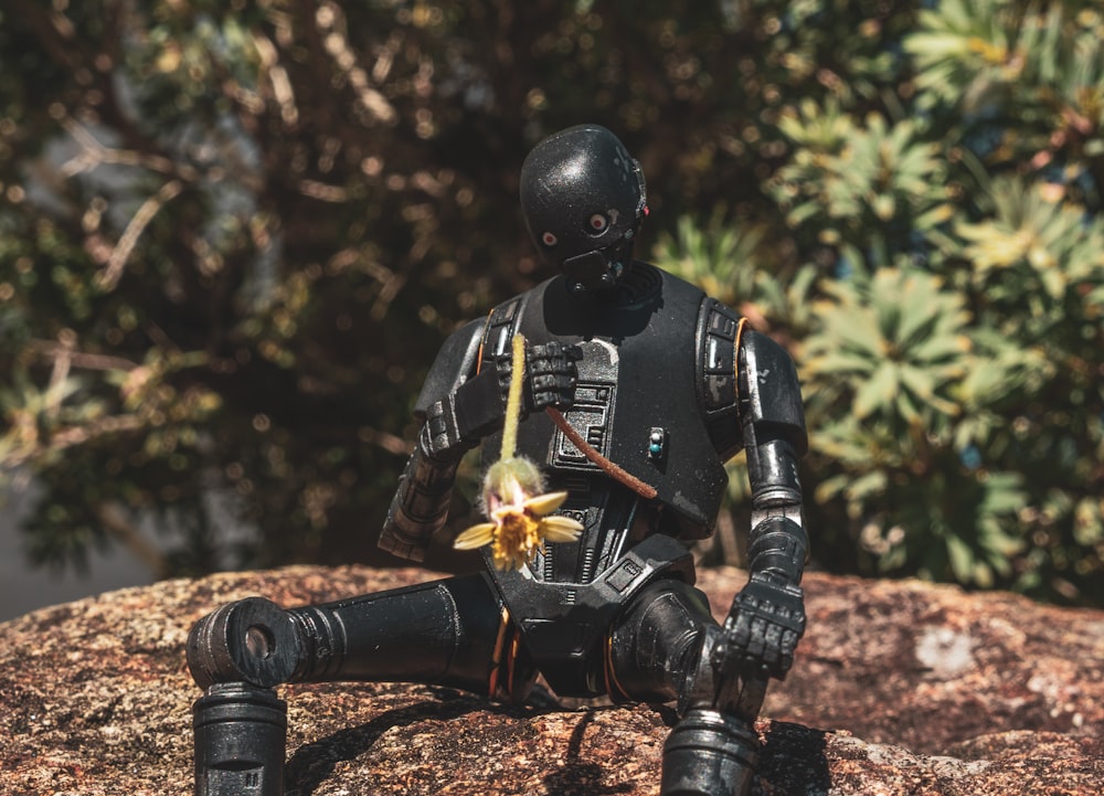 man in black and yellow suit wearing helmet