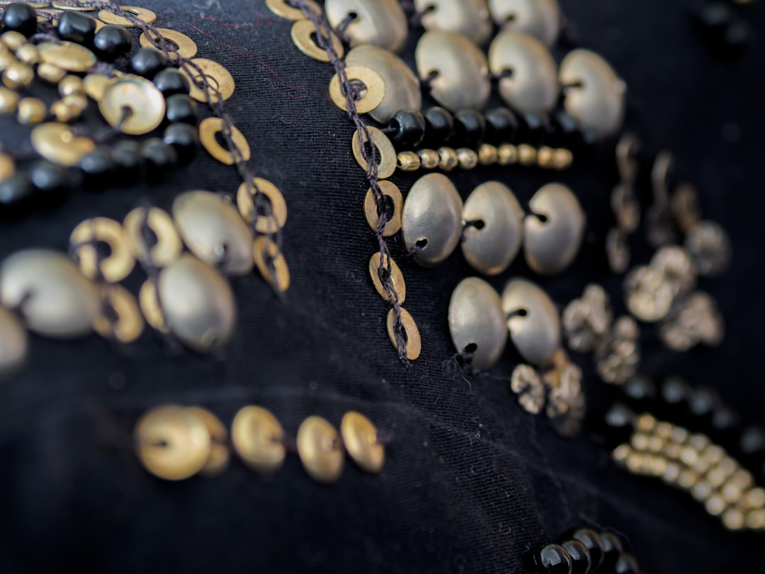 gold and silver beaded necklace